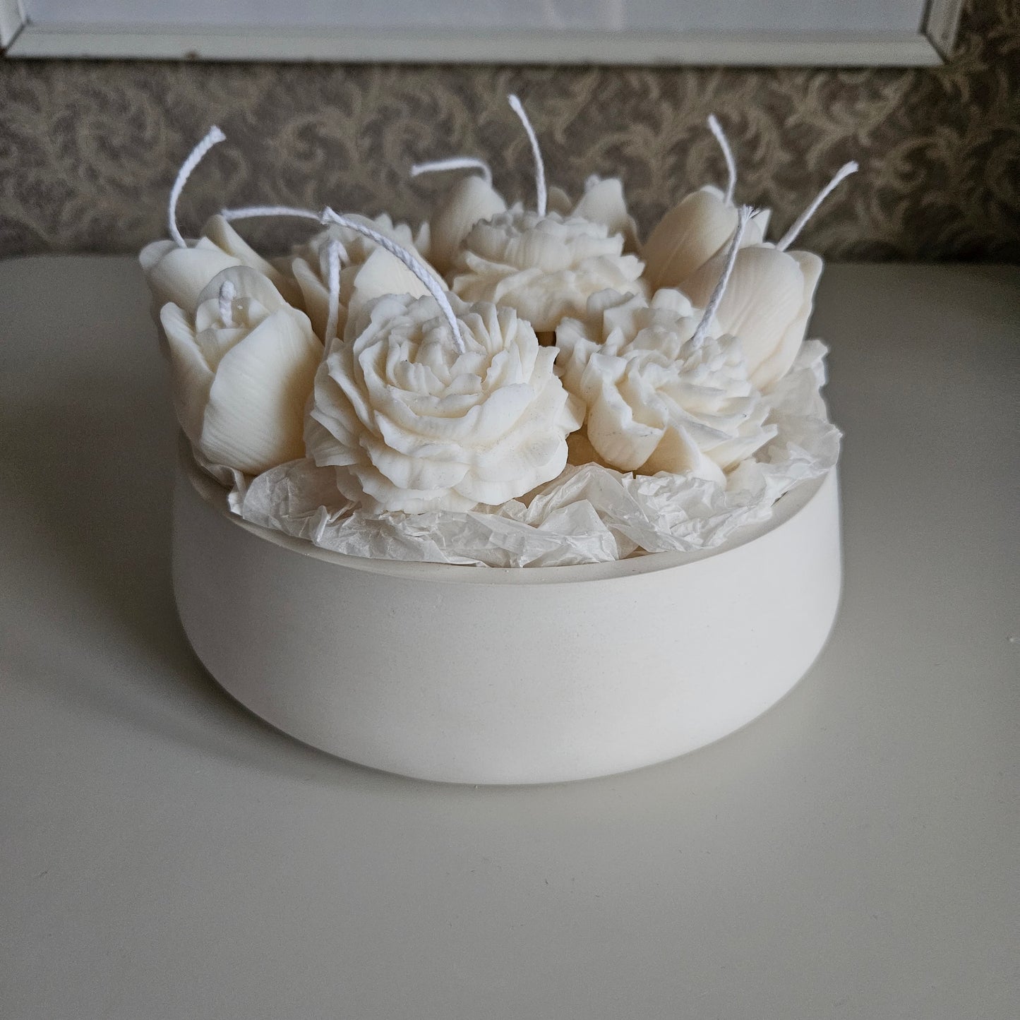 Candle flower bouquet in a plaster bowl peony, tulip and carnation