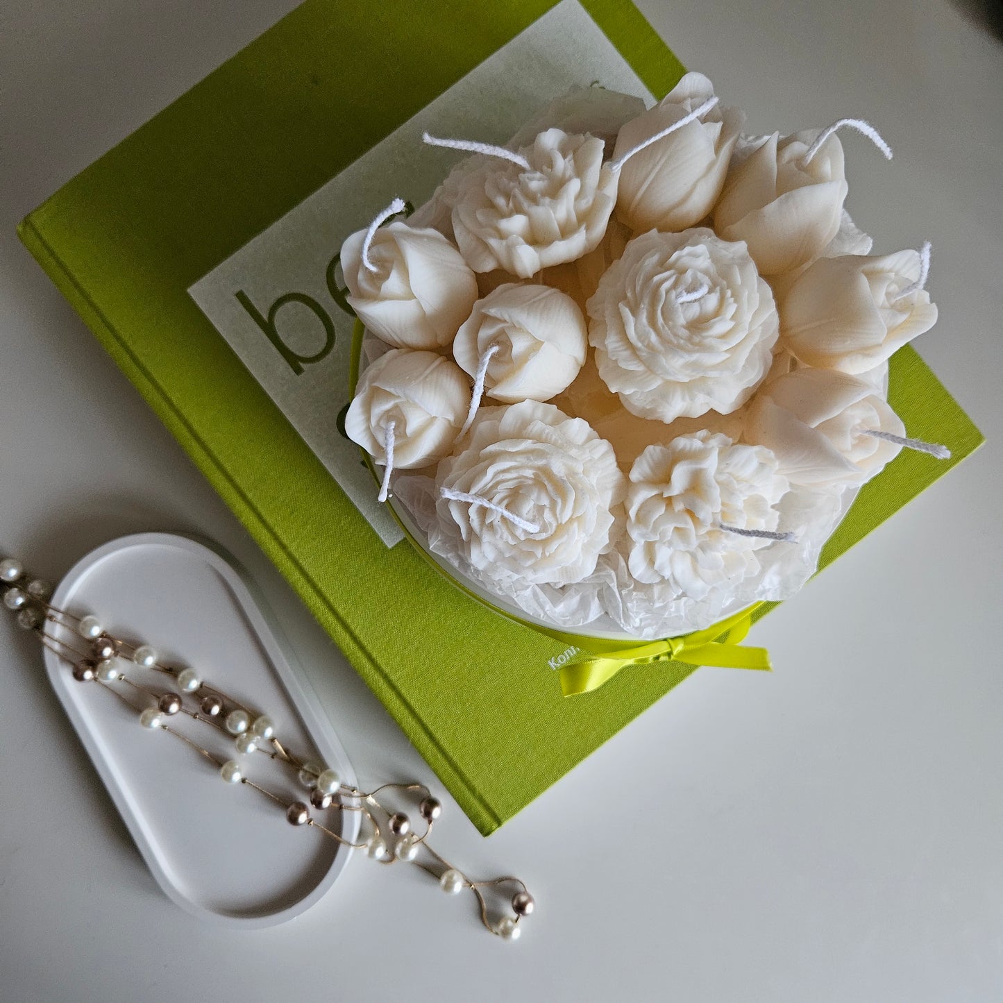 Candle flower bouquet in a plaster bowl peony, tulip and carnation