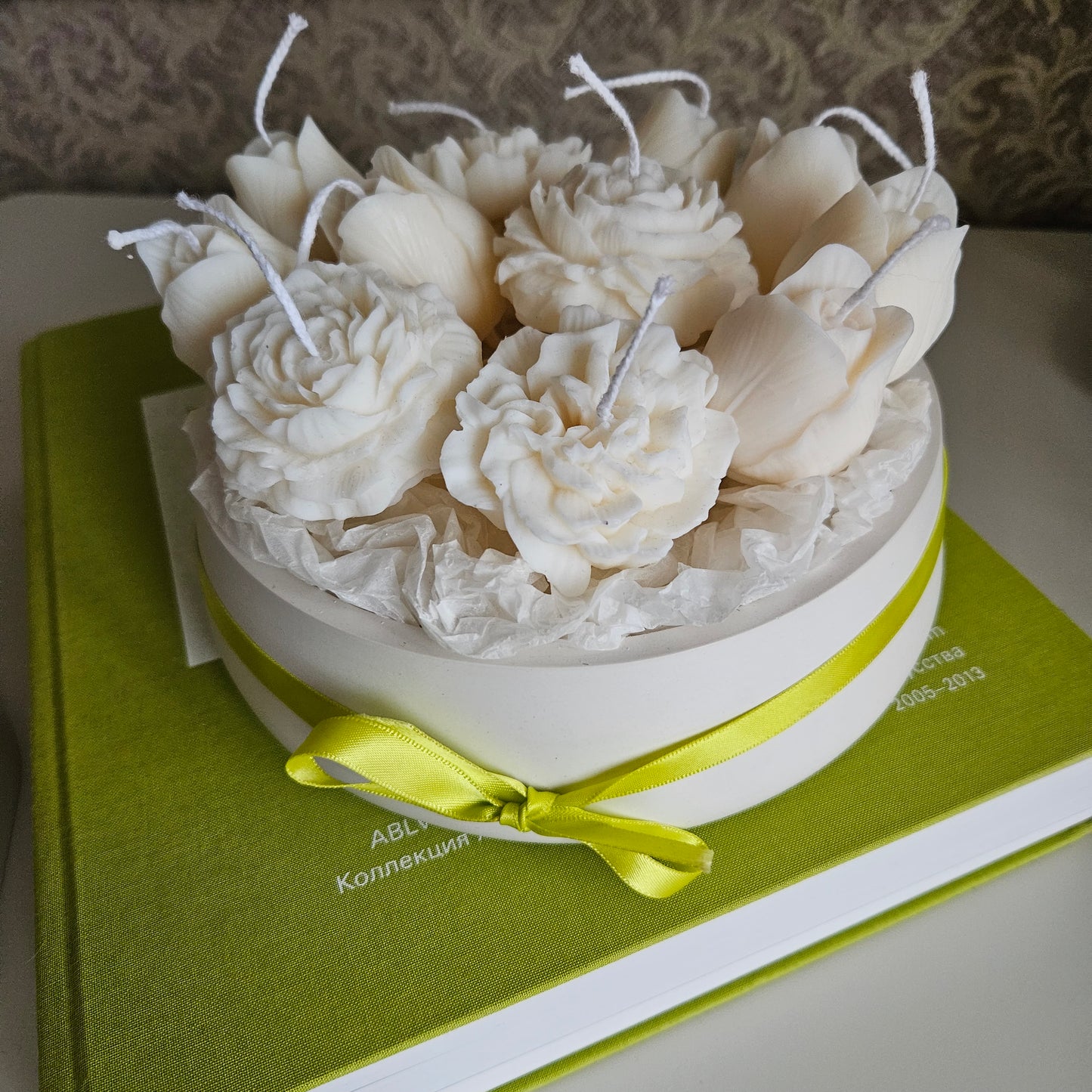 Candle flower bouquet in a plaster bowl peony, tulip and carnation