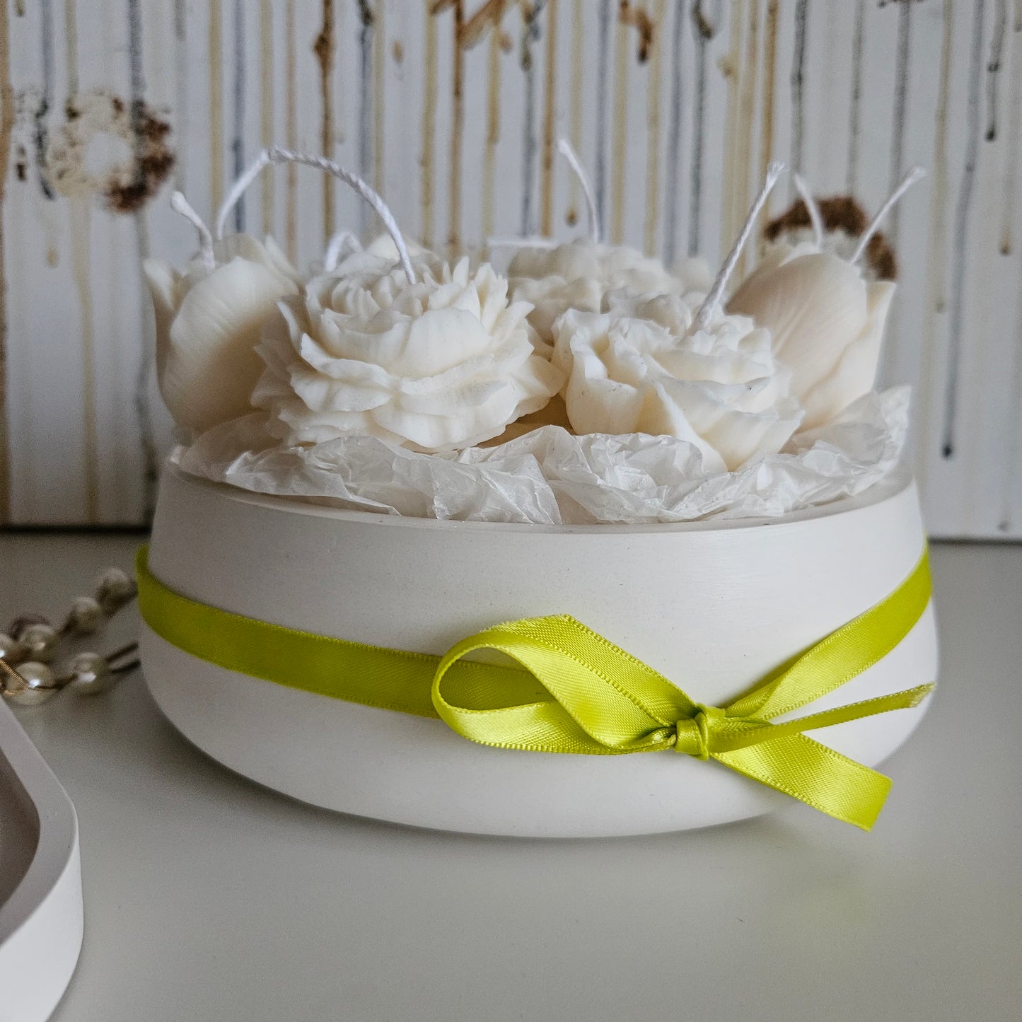 Candle flower bouquet in a plaster bowl peony, tulip and carnation