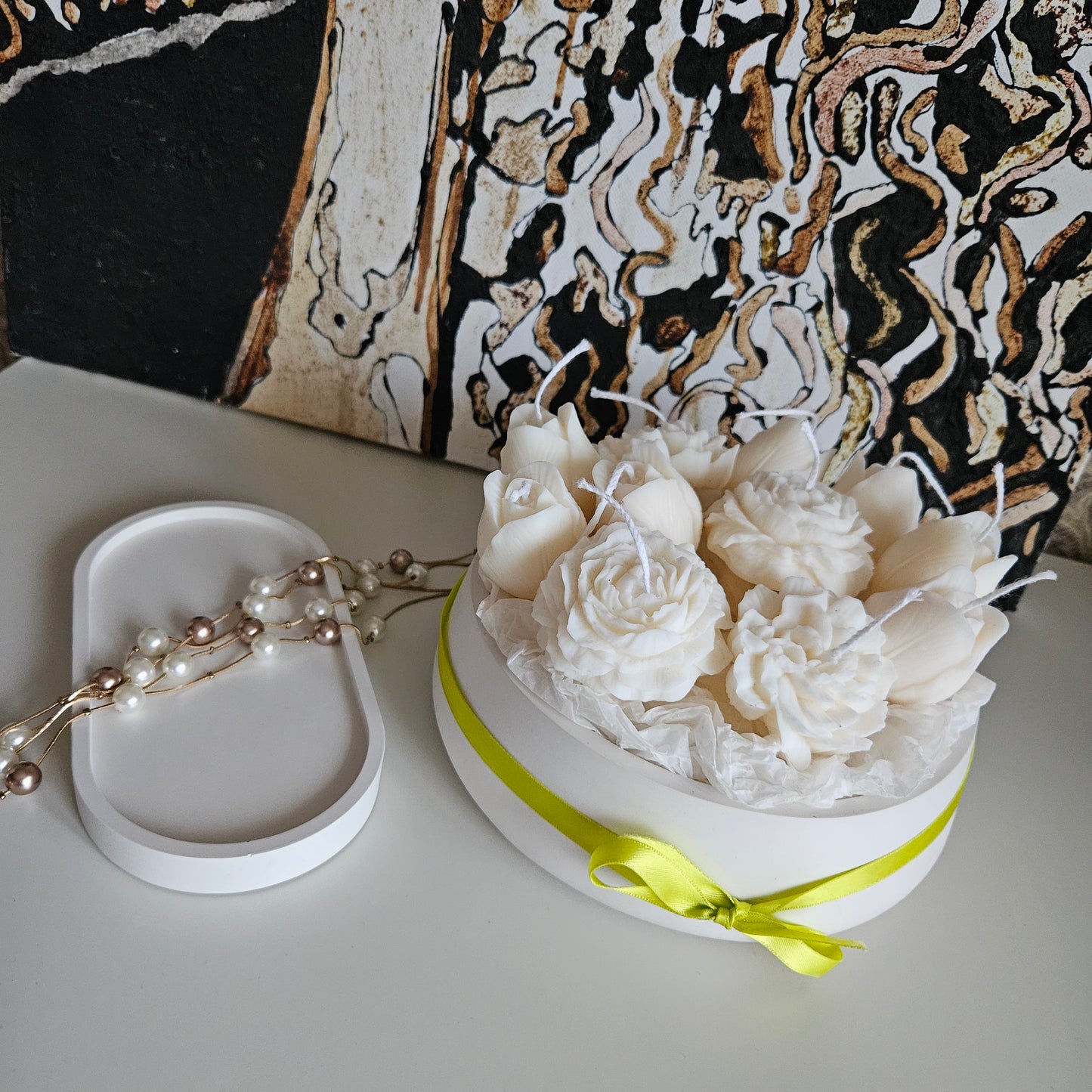 Candle flower bouquet in a plaster bowl peony, tulip and carnation