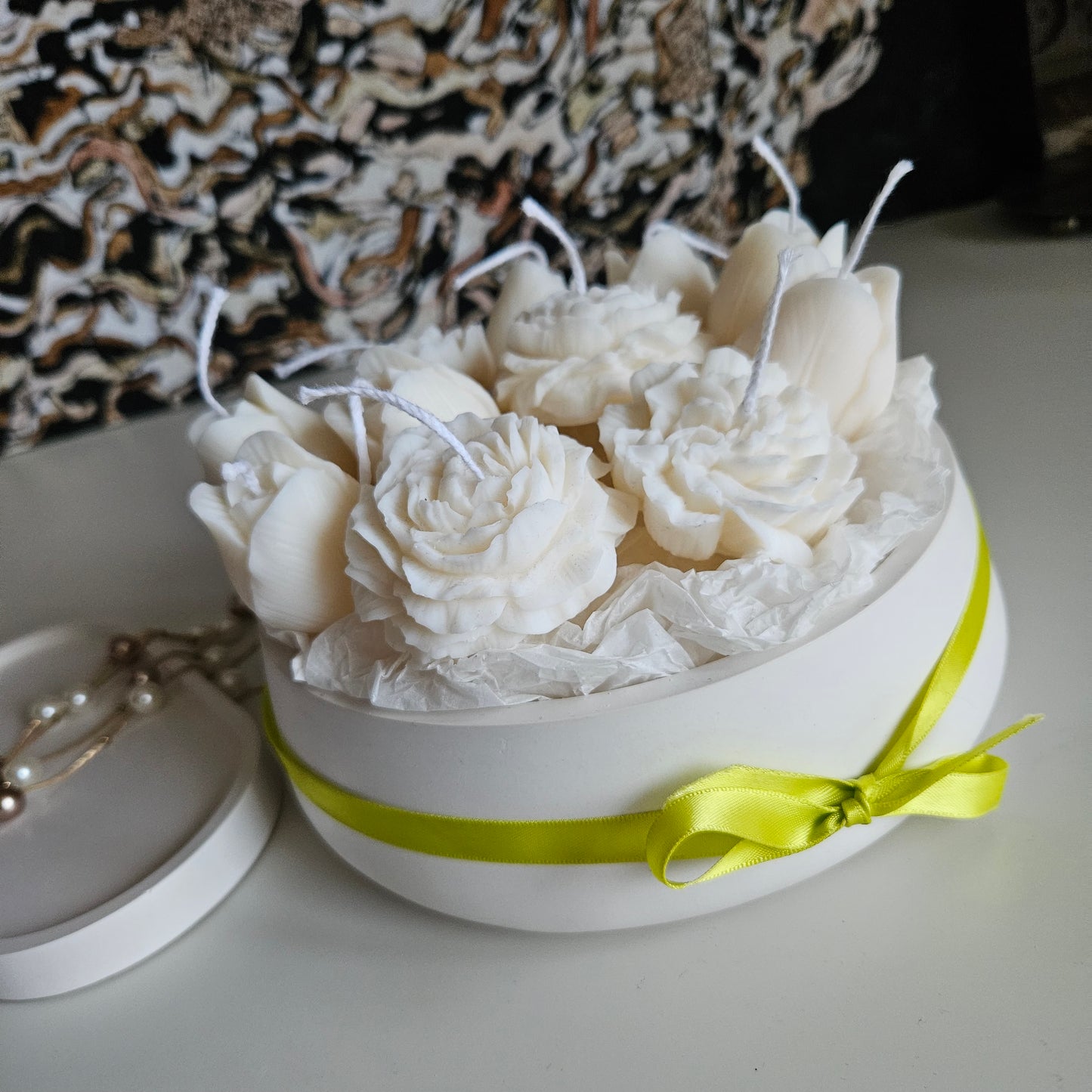 Candle flower bouquet in a plaster bowl peony, tulip and carnation