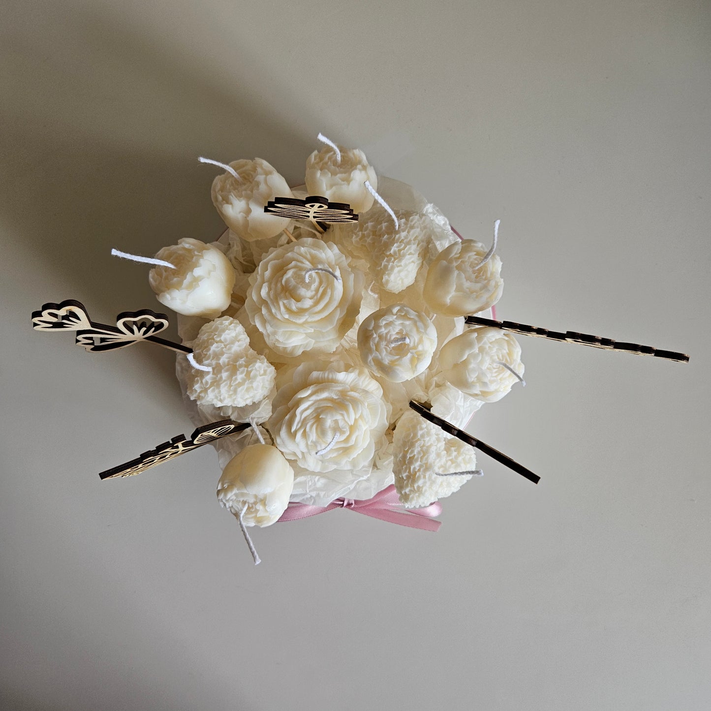 Candle flower bouquet in a plaster bowl peony and heart