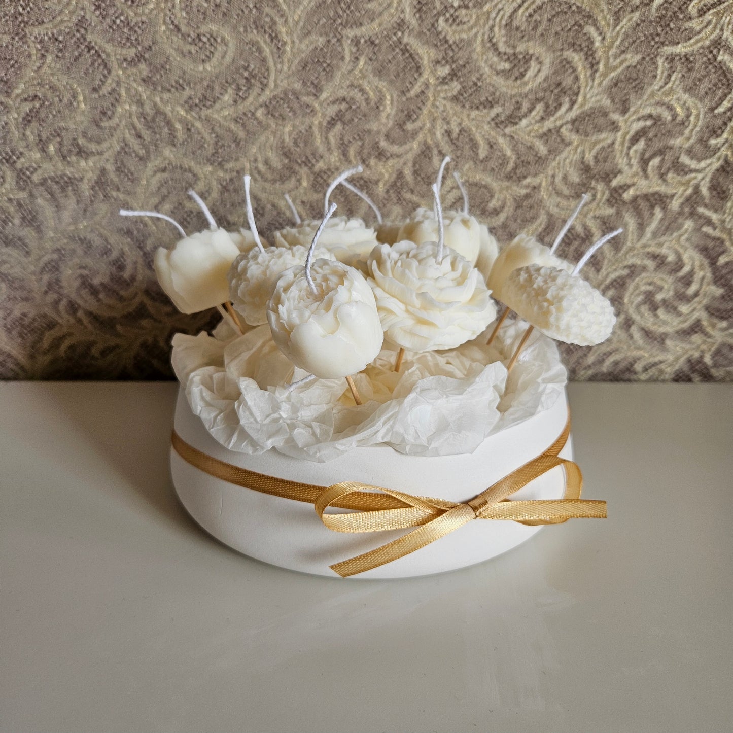 Candle flower bouquet in a plaster bowl peony and heart