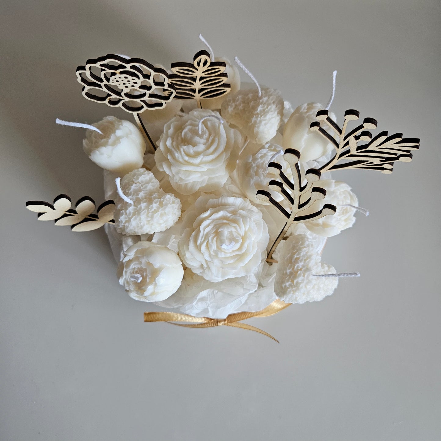 Candle flower bouquet in a plaster bowl peony and heart