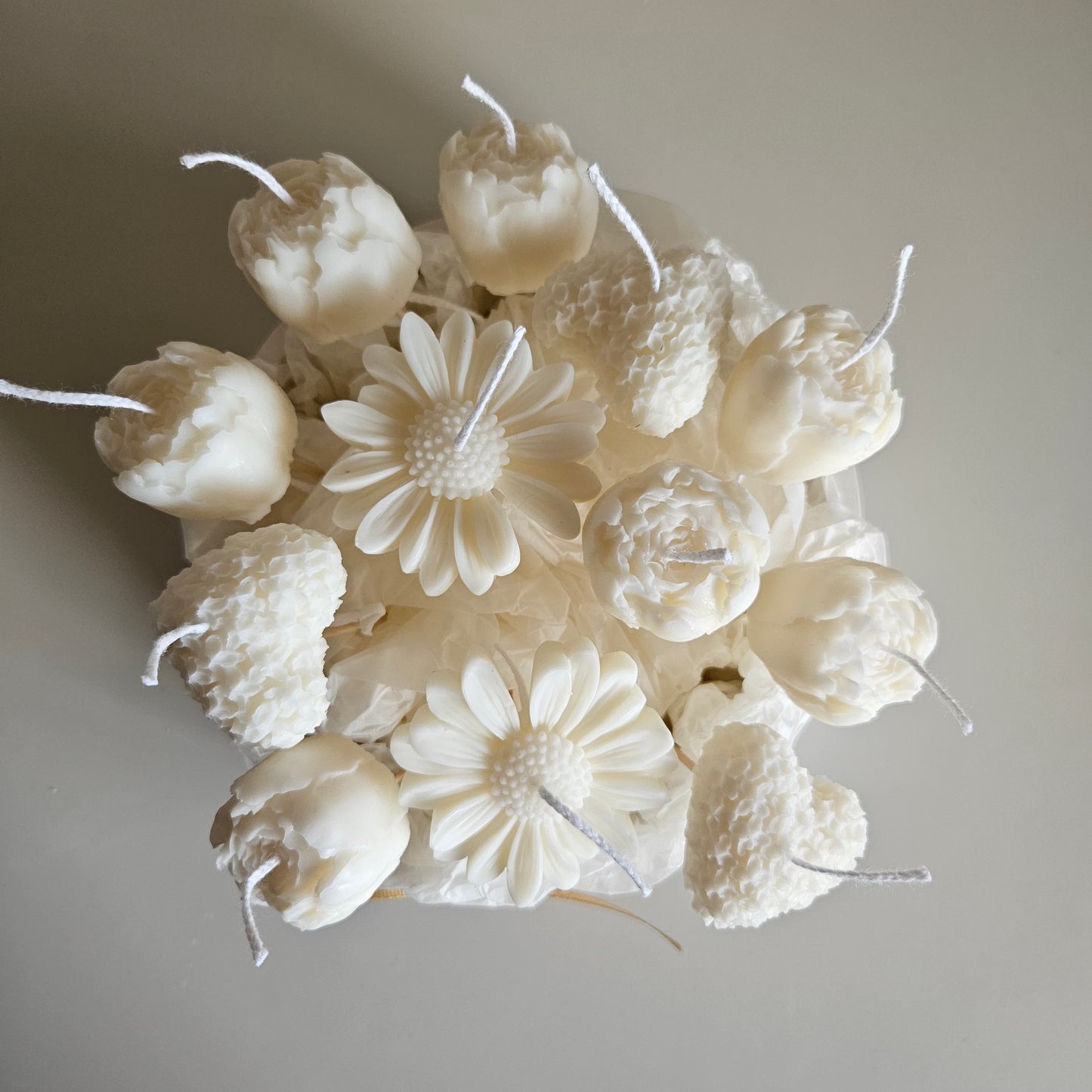 Candle flower bouquet in a plaster bowl peony, daisy and heart