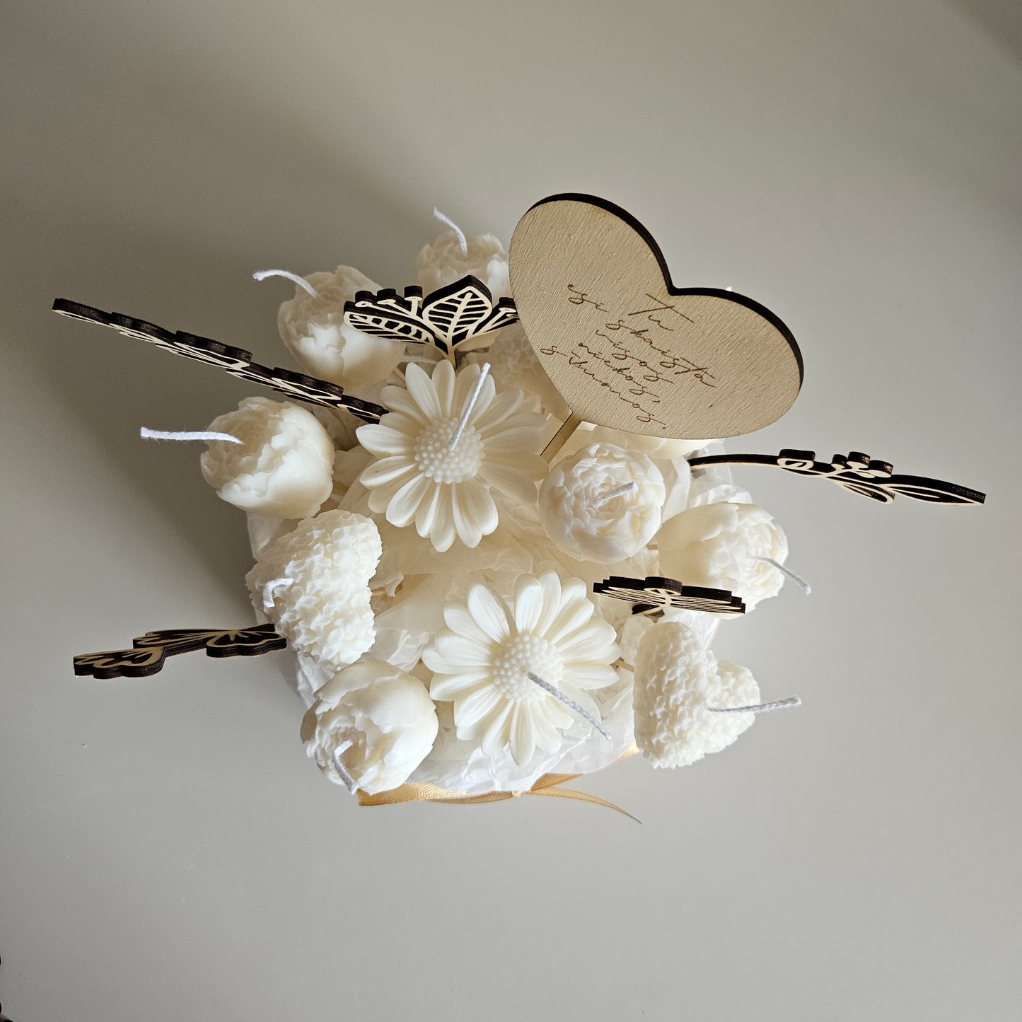 Candle flower bouquet in a plaster bowl peony, daisy and heart